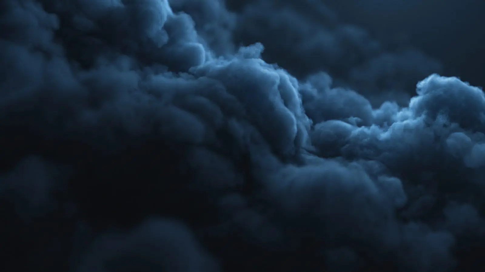 Layers of heavy cloud at dusk, seen from above.
